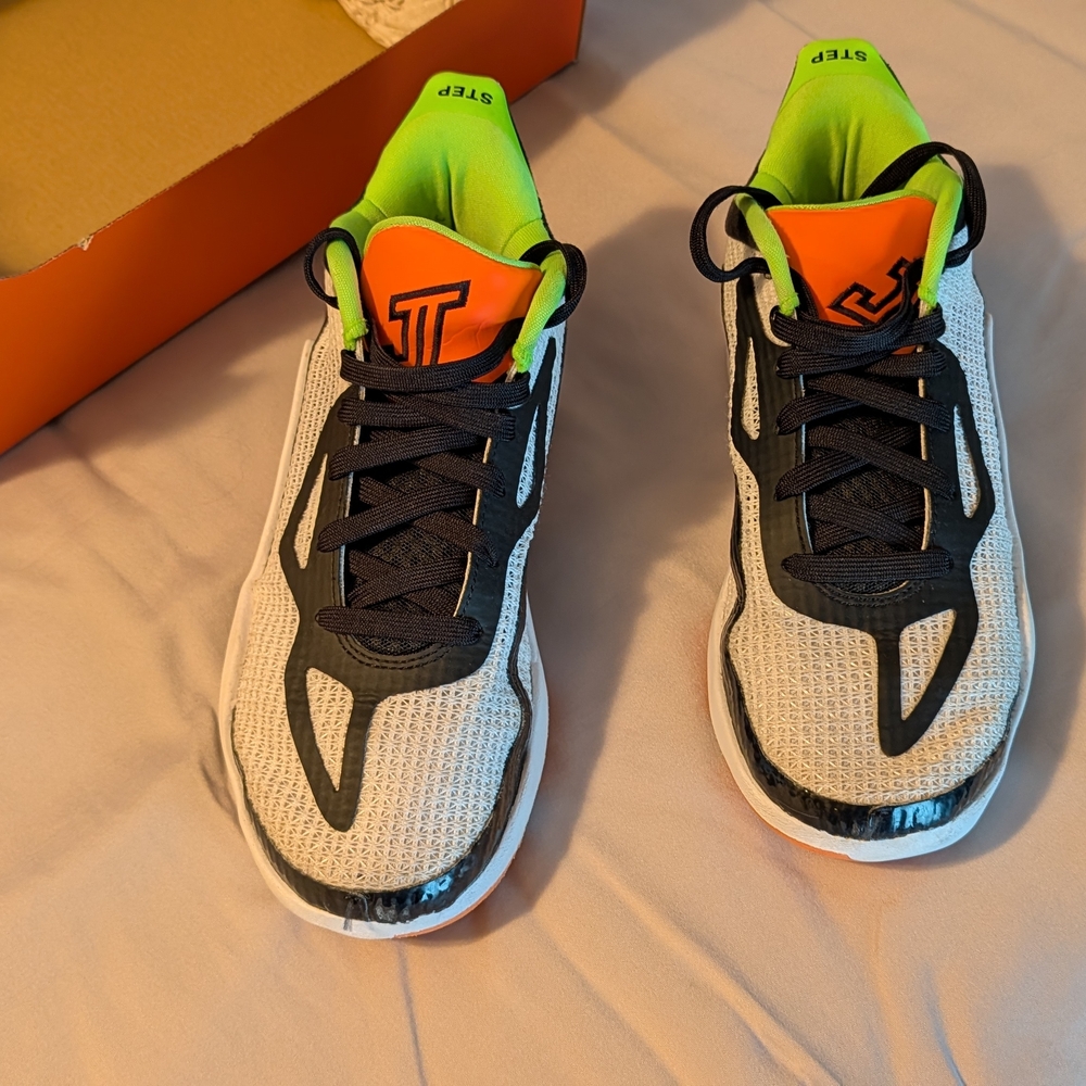 Kids Sneakers with Black, White, and Orange Accents